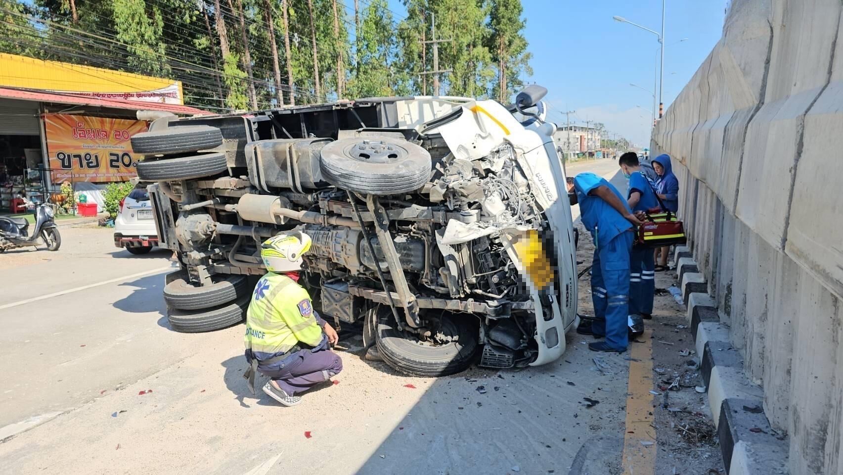 Thai truck driver walks away unscathed from Sukumvit smash