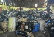 Bangkok police arrest scrap shop owners for pollution offences