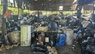 Bangkok police arrest scrap shop owners for pollution offences