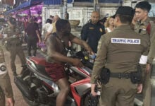 Shirtless tourist swallows traffic ticket in Pattaya police standoff