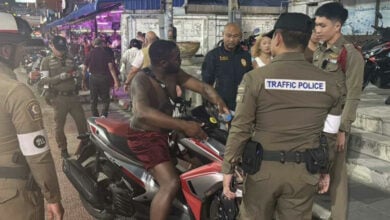 Shirtless tourist swallows traffic ticket in Pattaya police standoff