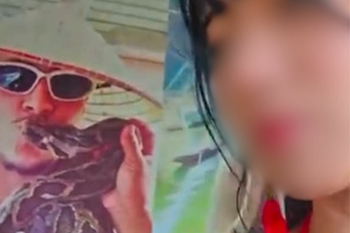 Thai snake charmer fined for squeezing influencer with overpriced photos