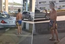 Boxer shorts-clad man blocks Bangkok traffic with Mercedes (video)