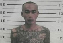 Inmate escapes from Thai prison, father urges surrender