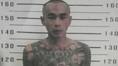 Inmate escapes from Thai prison, father urges surrender