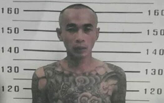 Inmate escapes from Thai prison, father urges surrender