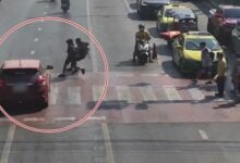 Student injured by car running red light in Bangkok