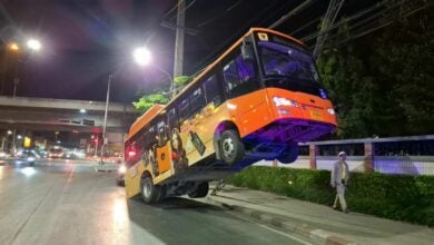 Bangkok bus skids on oil, crashes into electric pole cable (video)