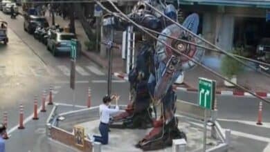 Bangkok bar offers Optimus Prime figure prayers for business success