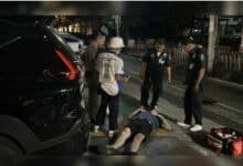 Drunken tourist passes out in front of Pattaya Police Station