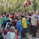 Surin locals hunt lottery numbers at temple ceremony