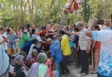 Surin locals hunt lottery numbers at temple ceremony