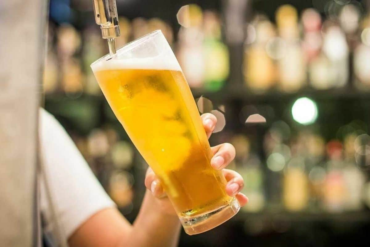 Ex-alcohol chief toasts potential gains from lifting drink sales ban