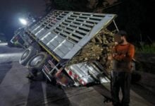 Truck falls through damaged bridge in Prachuap Khiri Khan