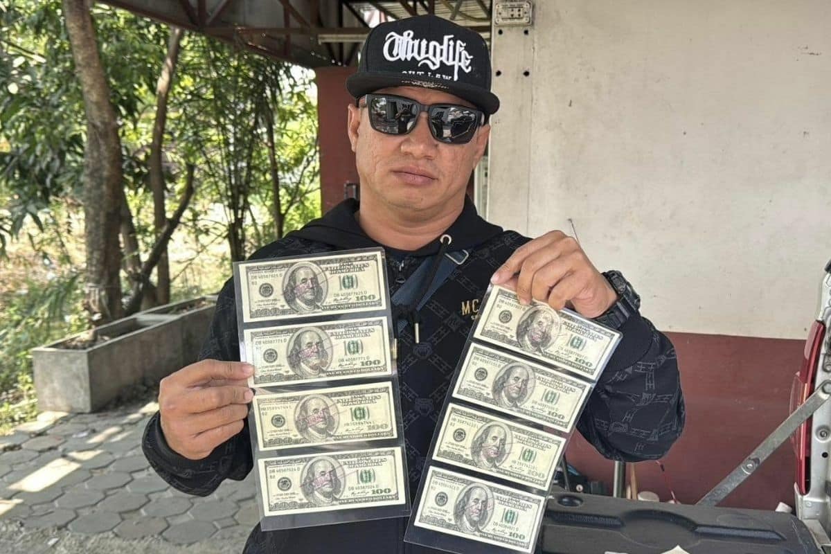 Thai motorcycle taxi rider loses nearly 30,000 baht in fake dollar scam