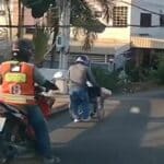 Thai motorcyclist praised for his kindness to disabled man in Bangkok | Thaiger