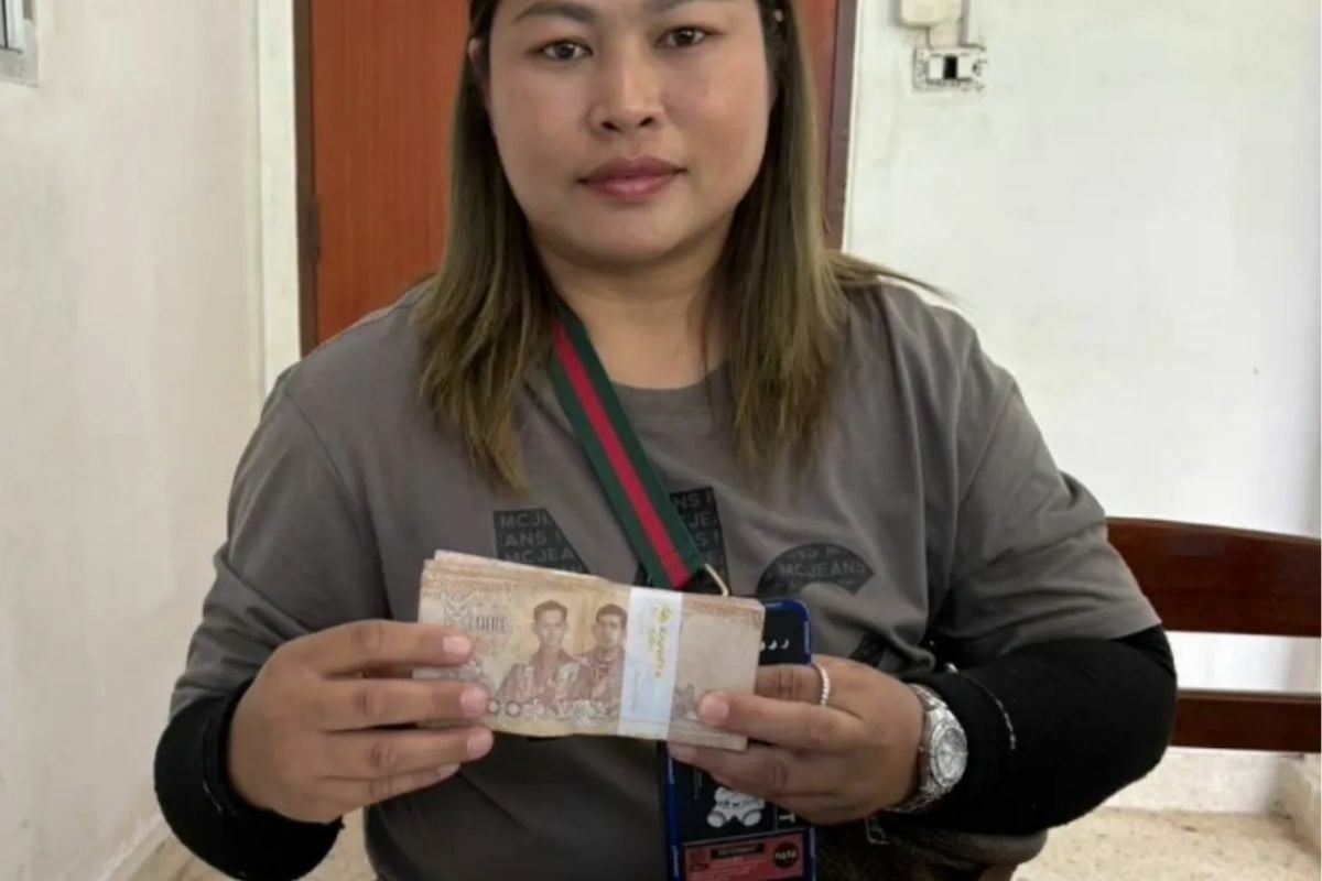 Thai woman gives job to garbage collector who returns lost cash