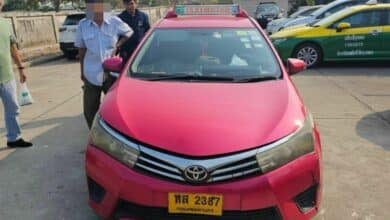 Thai taxi driver hits rock bottom, then throws rocks at Bangkok cab