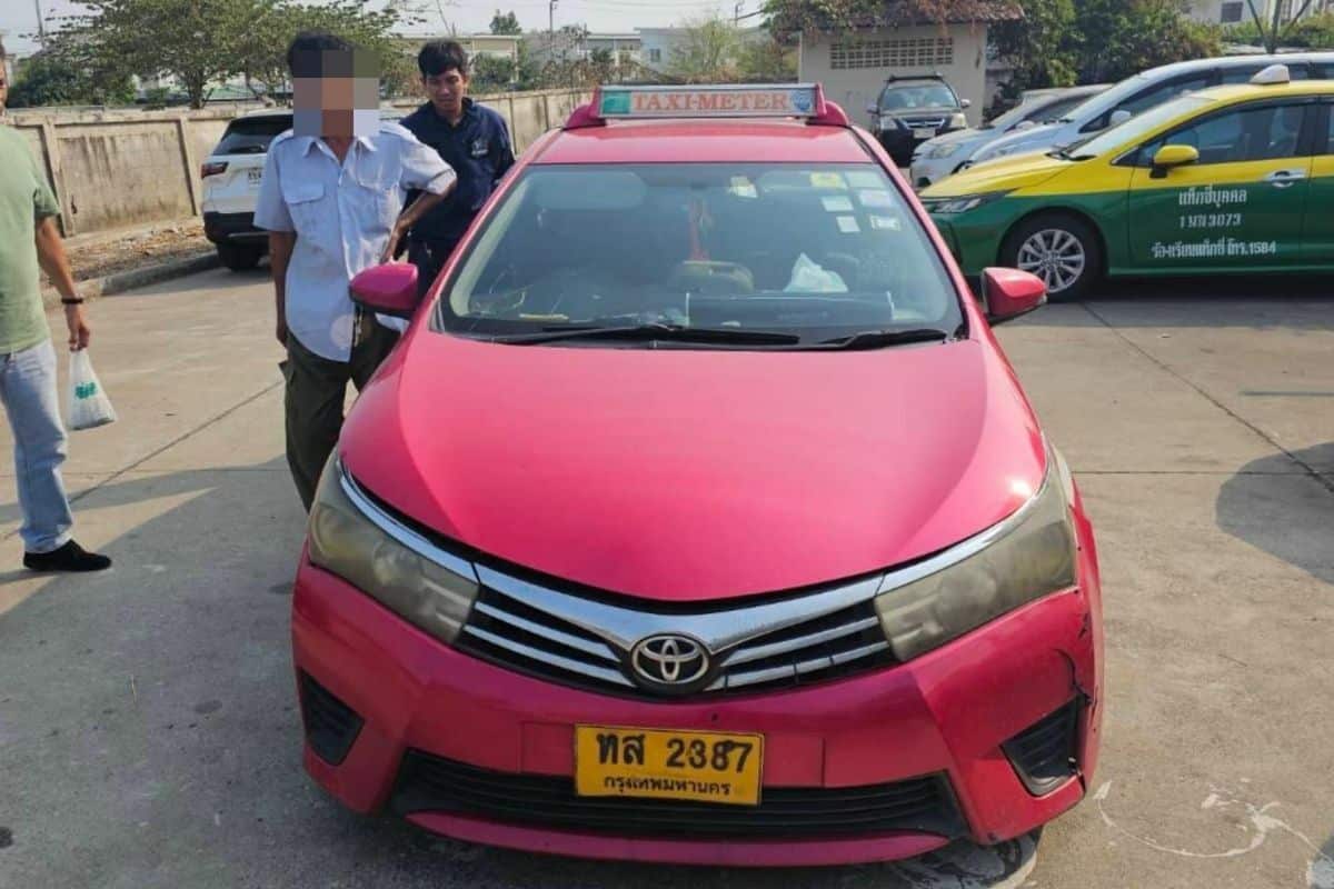 Thai taxi driver hits rock bottom, then throws rocks at Bangkok cab