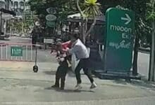 Thai driver reverses into security guard and assaults him in parking dispute