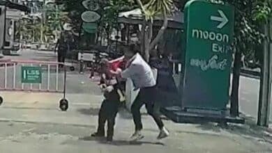 Thai driver reverses into security guard and assaults him in parking dispute