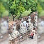 Indian tourists climb Buddha statue for mangoes in Ayutthaya (video) | Thaiger