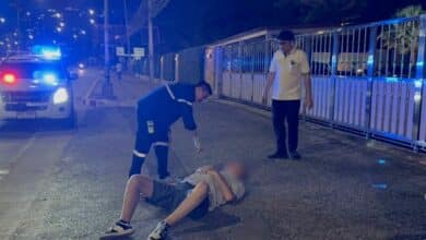 American throws drunken fit in the middle of a Pattaya road
