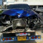 German man crashes BMW in Phuket, narrowly misses motorbike