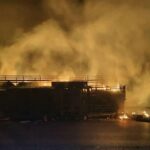 Truck overturns and ignites on Mittraphap Road, injuring two
