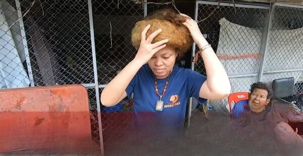Trang woman claims uncut hair has supernatural powers (video) | News by Thaiger