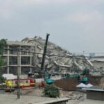 Families receive bodies of three from Bangkok building collapse | Thaiger