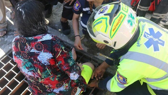 Teen girl's leg trapped in drainage grate during Songkran festival | News by Thaiger