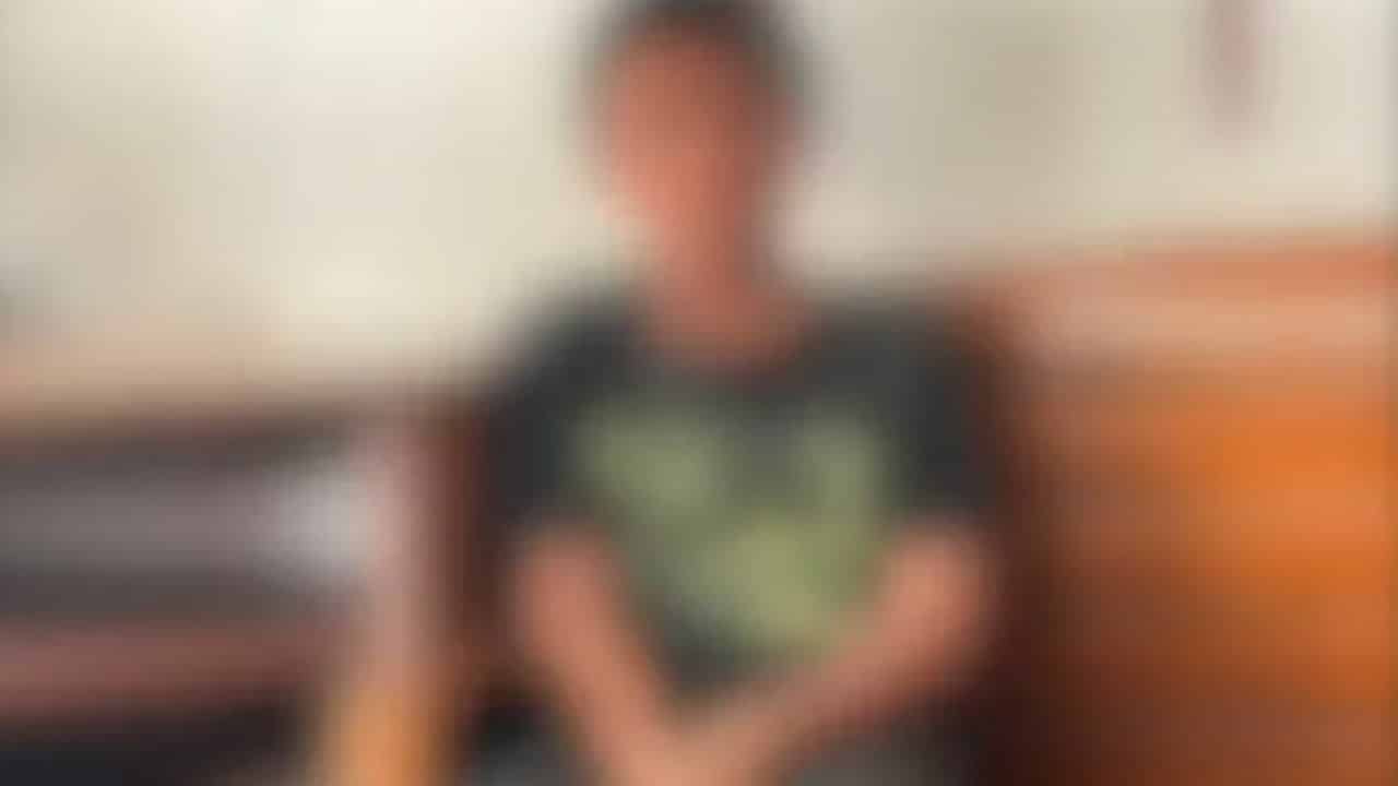 Young Thai boy forced to sell fruits on Bang Saray Beach