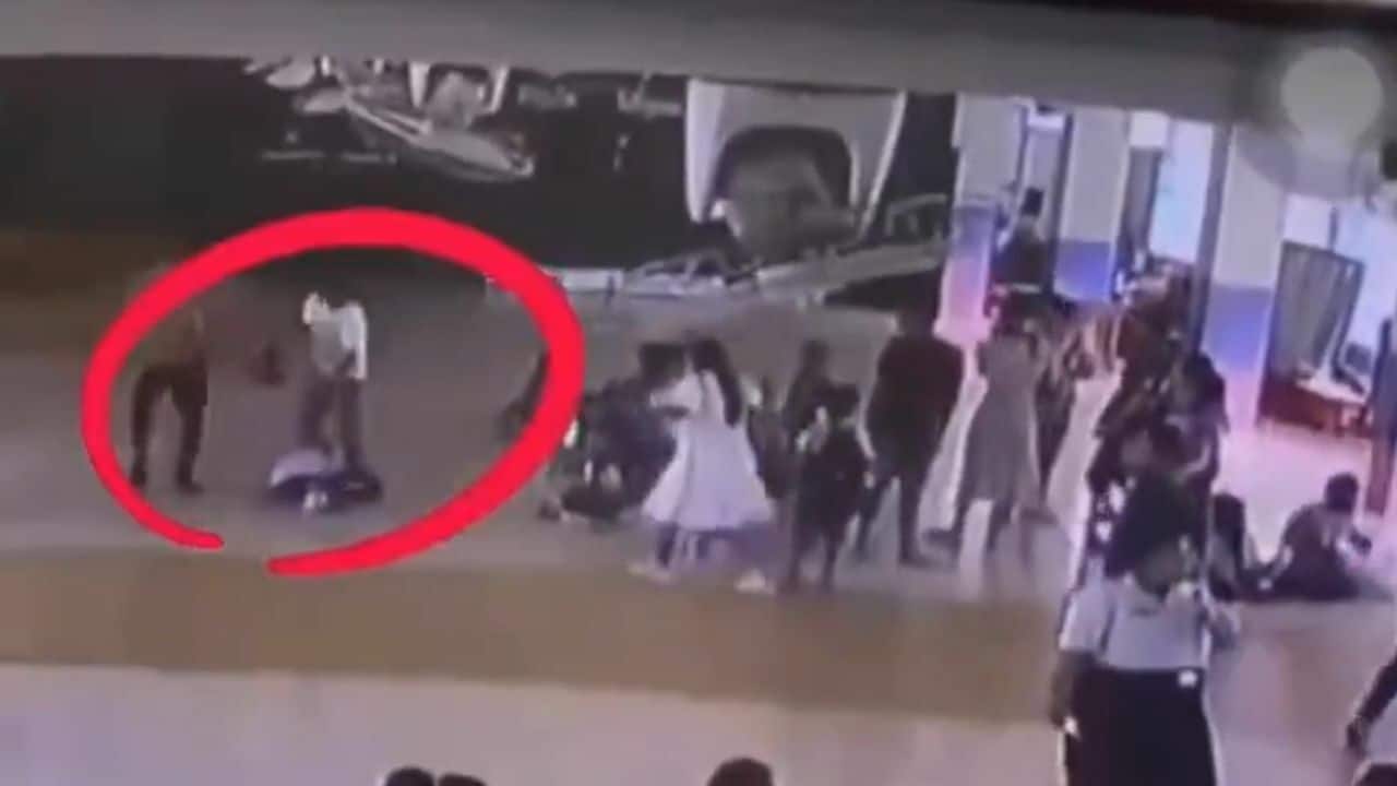 Thai man kicks six year old boy in kindergarten