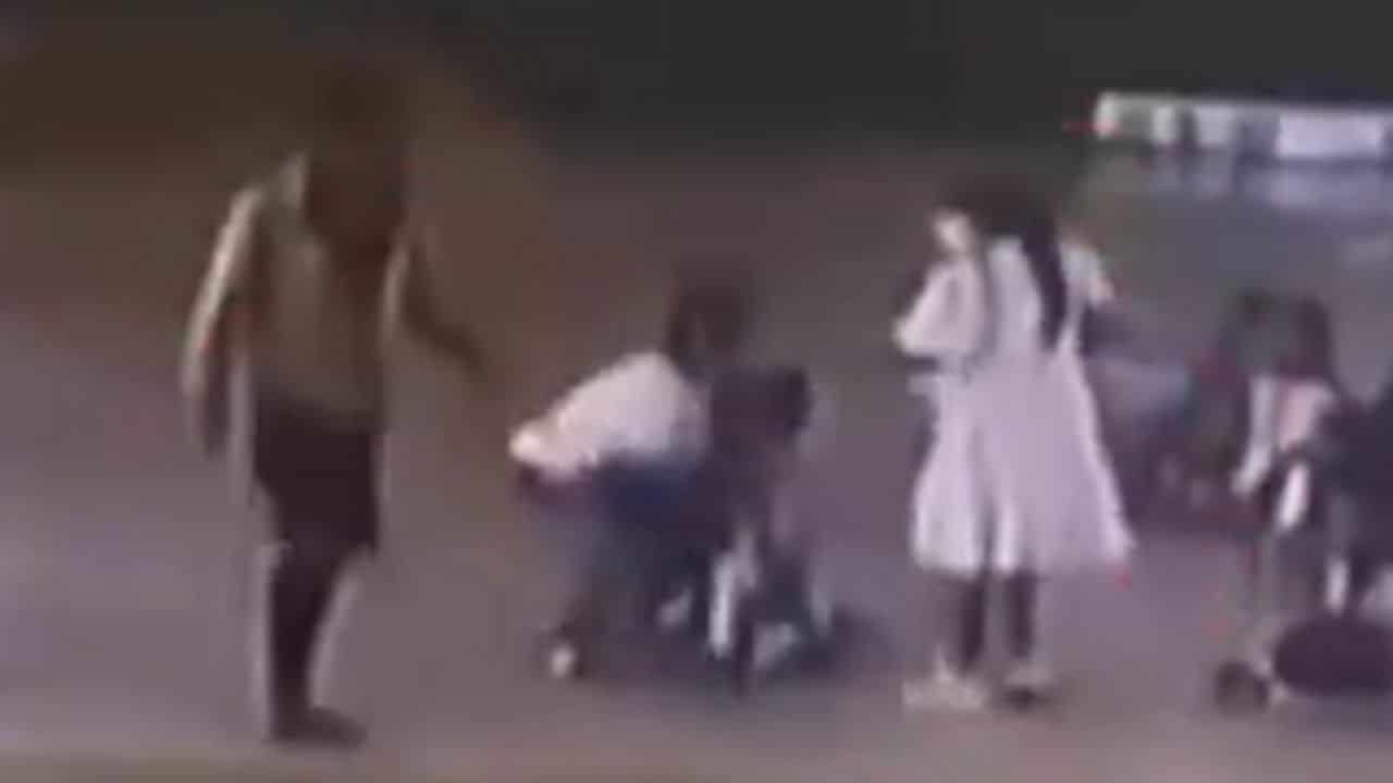 Father kicks boy for causing his child injury