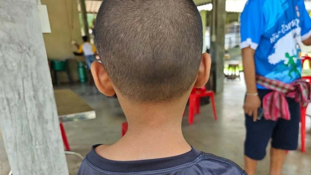 Thai boy kicked in school