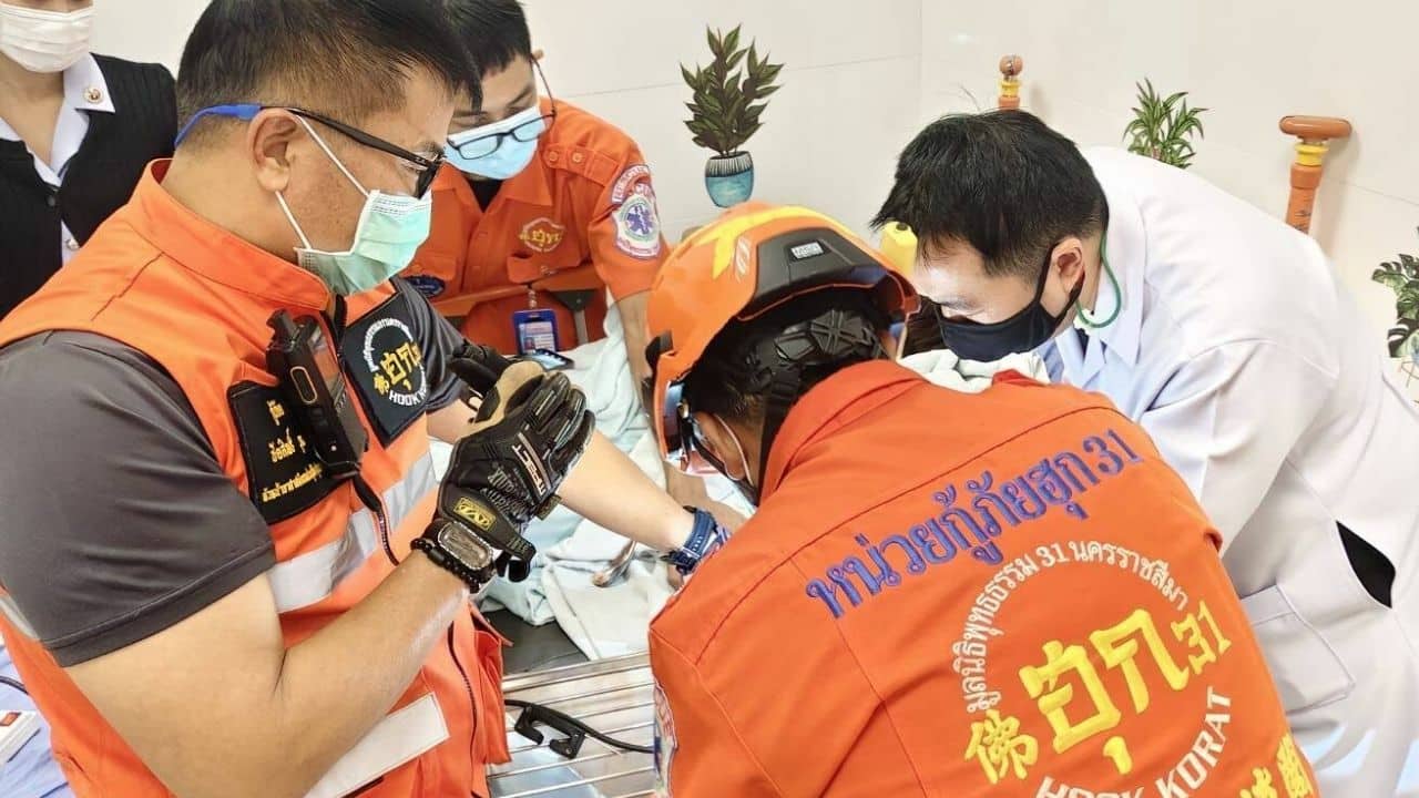 Rescuers and medical team remove finger from doorknob