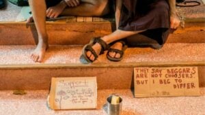 Begpackers, buskers, and the ethics of modern travel