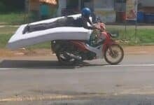 Thai man goes viral for ‘sleep-riding’ motorbike stunt on a mattress (video)