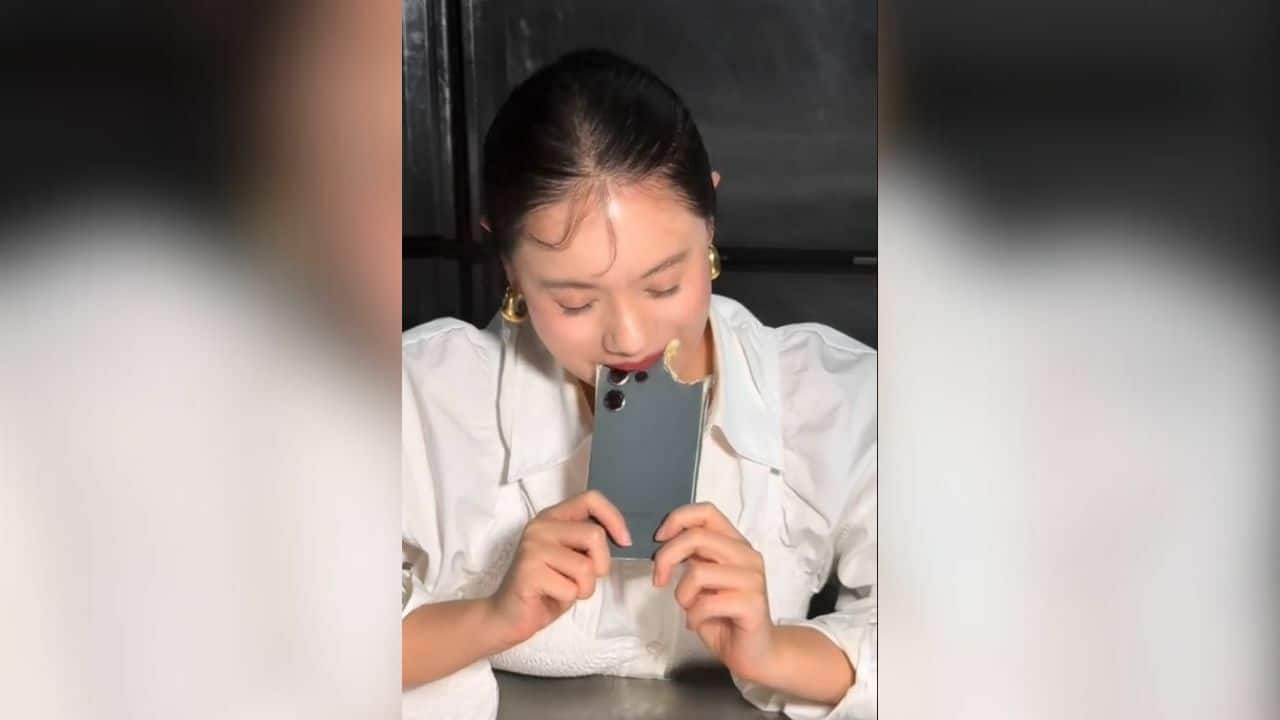 ‘Phone-eating’ TikToker’s cake illusions spark safety fears (video)