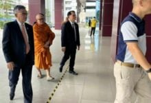 Abbot denies 300 million baht embezzlement, gambling claims