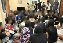 Police raid birthday party in Chon Buri, arrest 55 with drugs