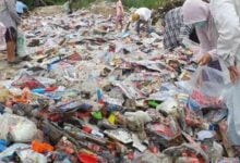 Chon Buri locals flock to collect free toys from waste site