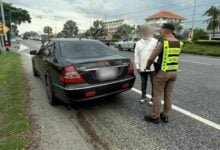 Thai man arrested for using fake licence plate on luxury car