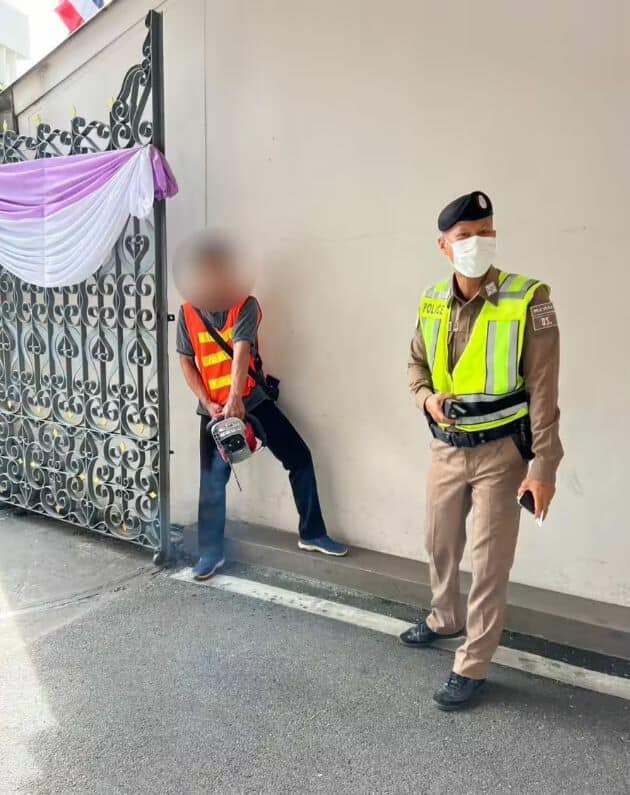 Man with chainsaw storms Government House over unpaid wages | News by Thaiger