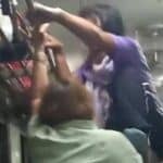 Thai woman attempts to kick fellow passenger off moving train