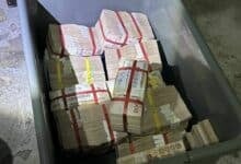 Thai woman finds 12 million baht in plastic box at condo rubbish area