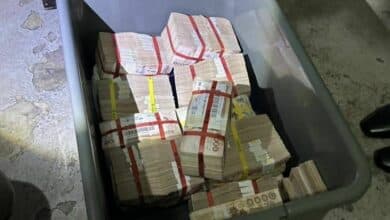 Thai woman finds 12 million baht in plastic box at condo rubbish area
