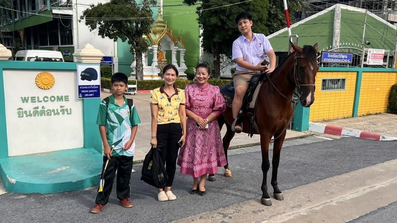 Riding horse to school in Ang Thong