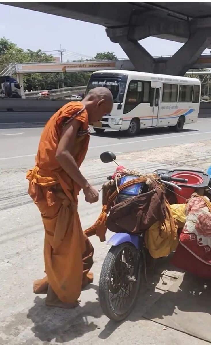 Imposter monk drags motorcycle along road in Korat (video) | News by Thaiger
